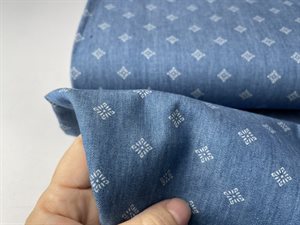 Fastvævet bomuld - jeansblå med smukt mønster